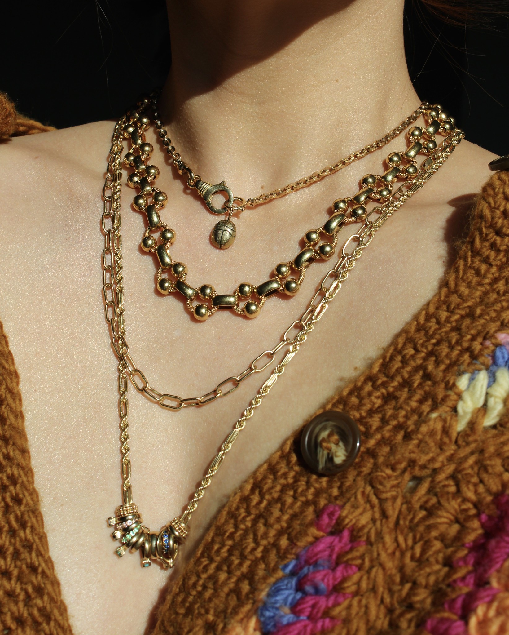 gold necklace layers
