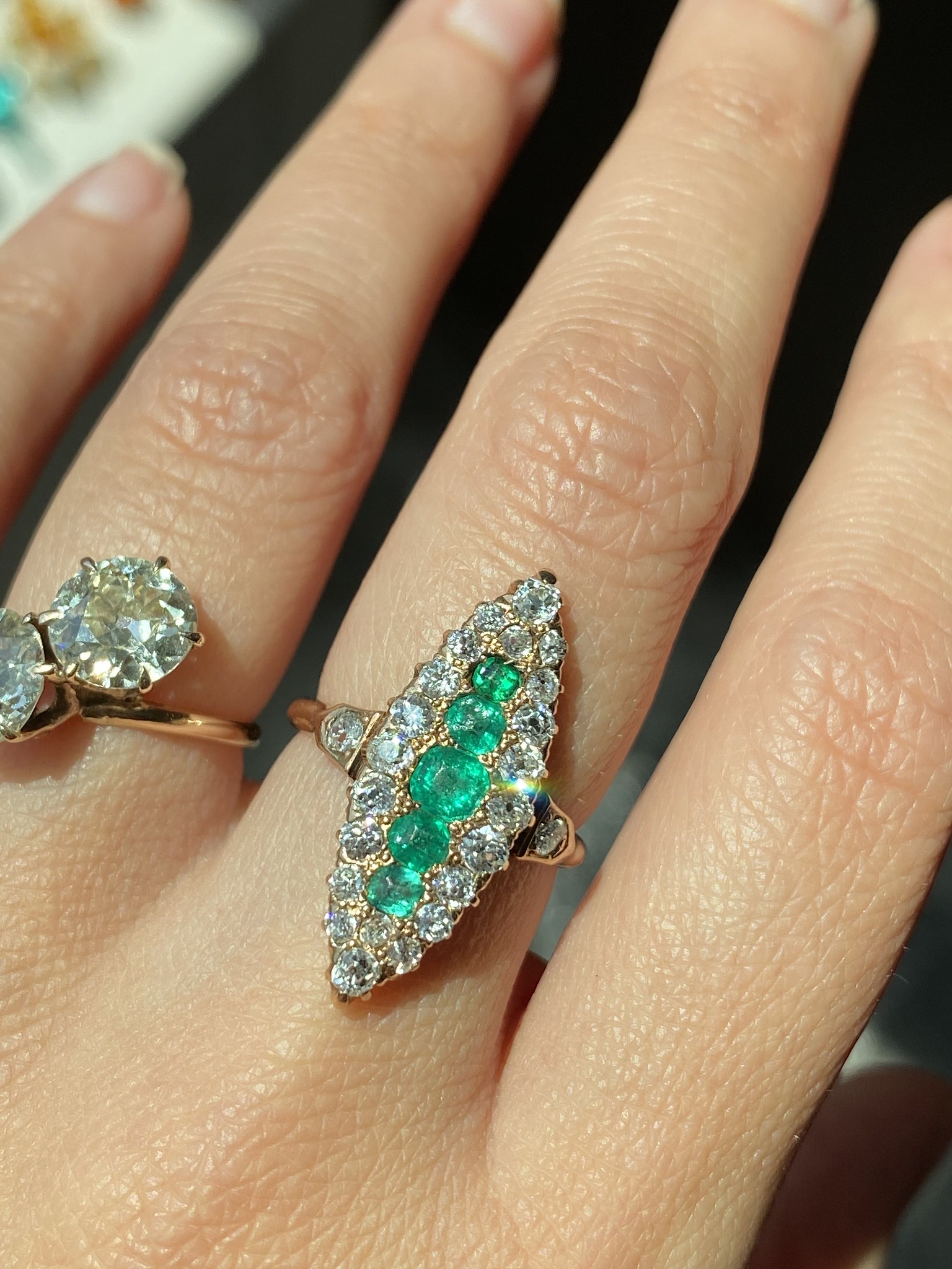 diamond and emerald navette ring